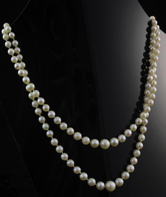 A 1980s double strand graduated cultured pearl necklace, 21.5in.